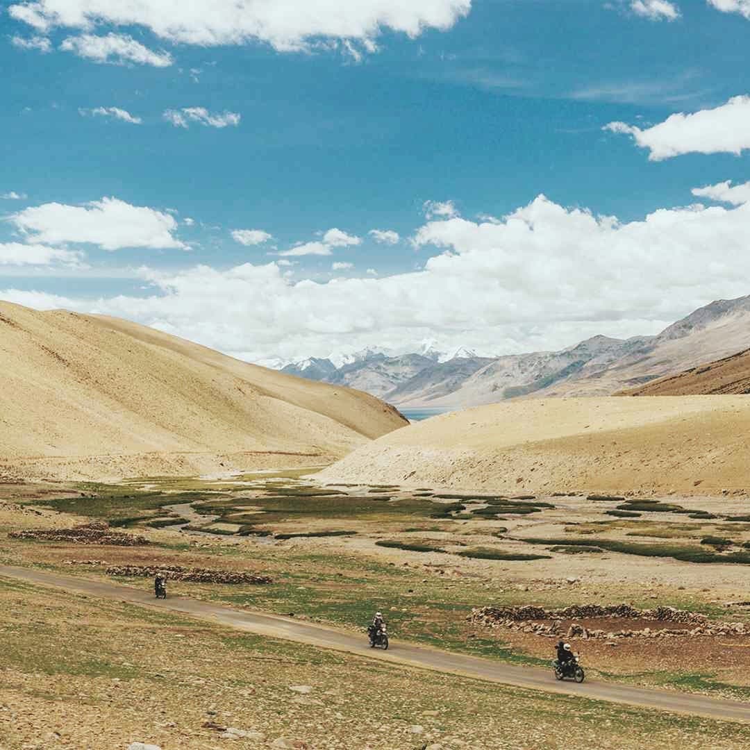 Man on Royal Enfield bike in the Himalaya