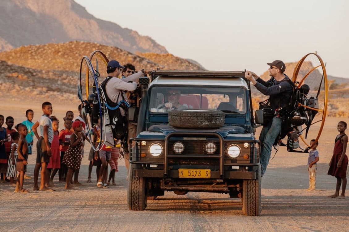 People on car in Namibia