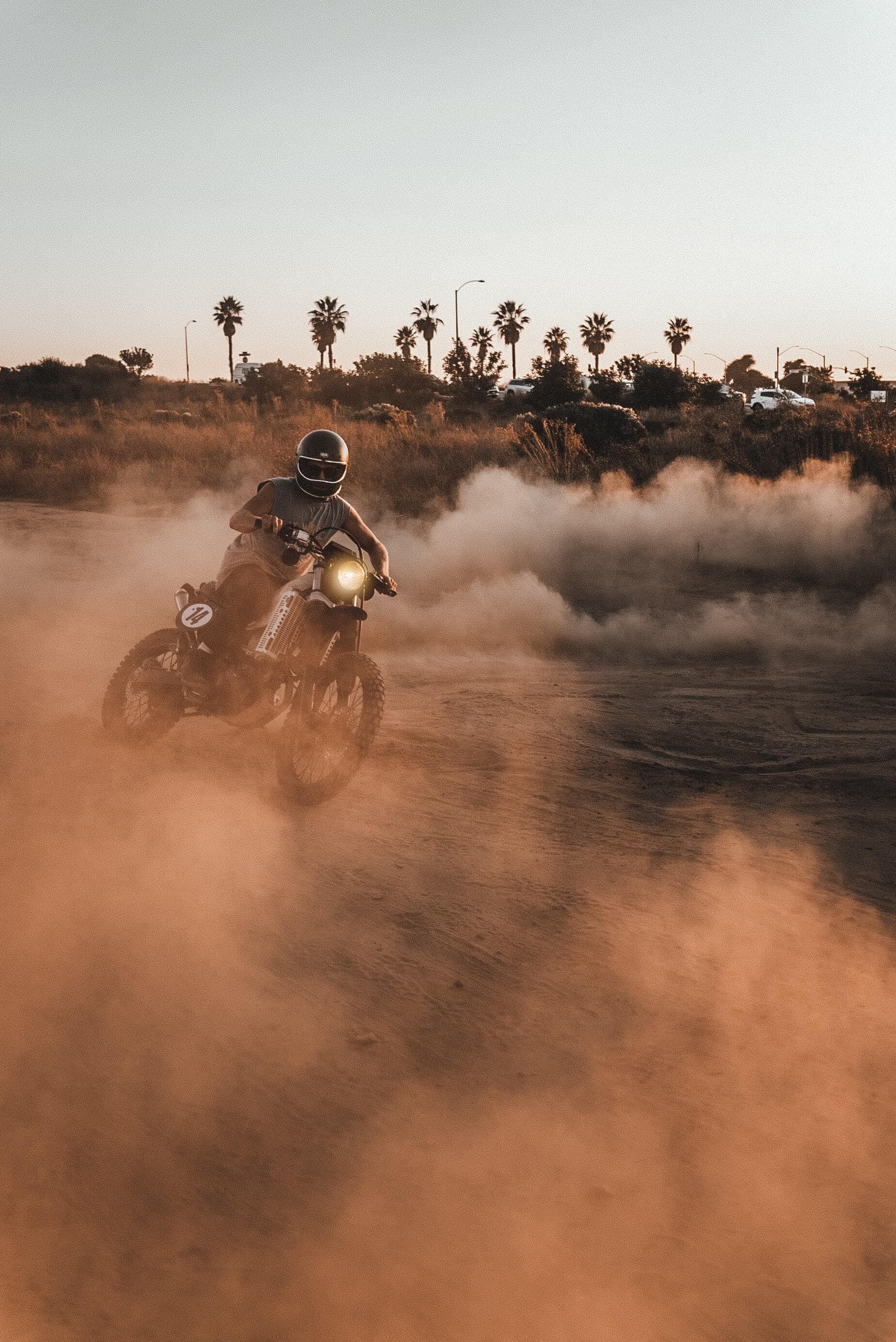 Guy riding enduro bike in the dirt roads of LA