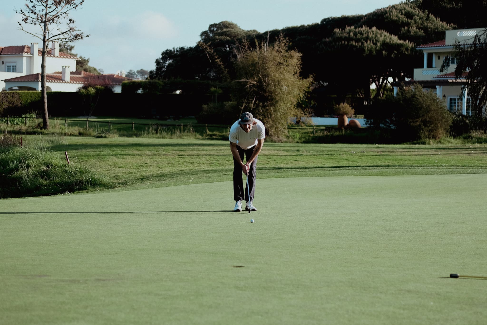 Andy looking a golf hole