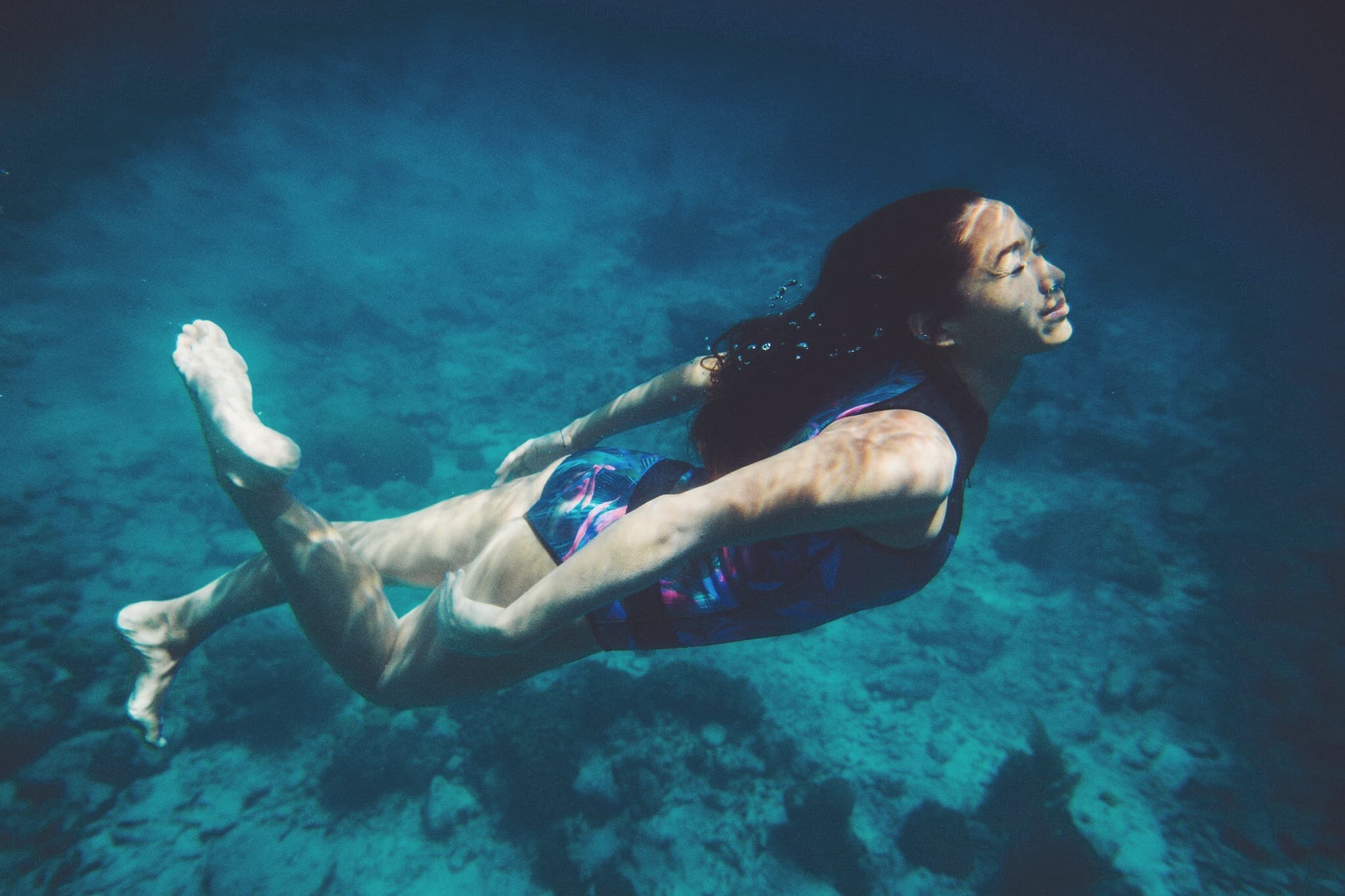 girl swims in the water