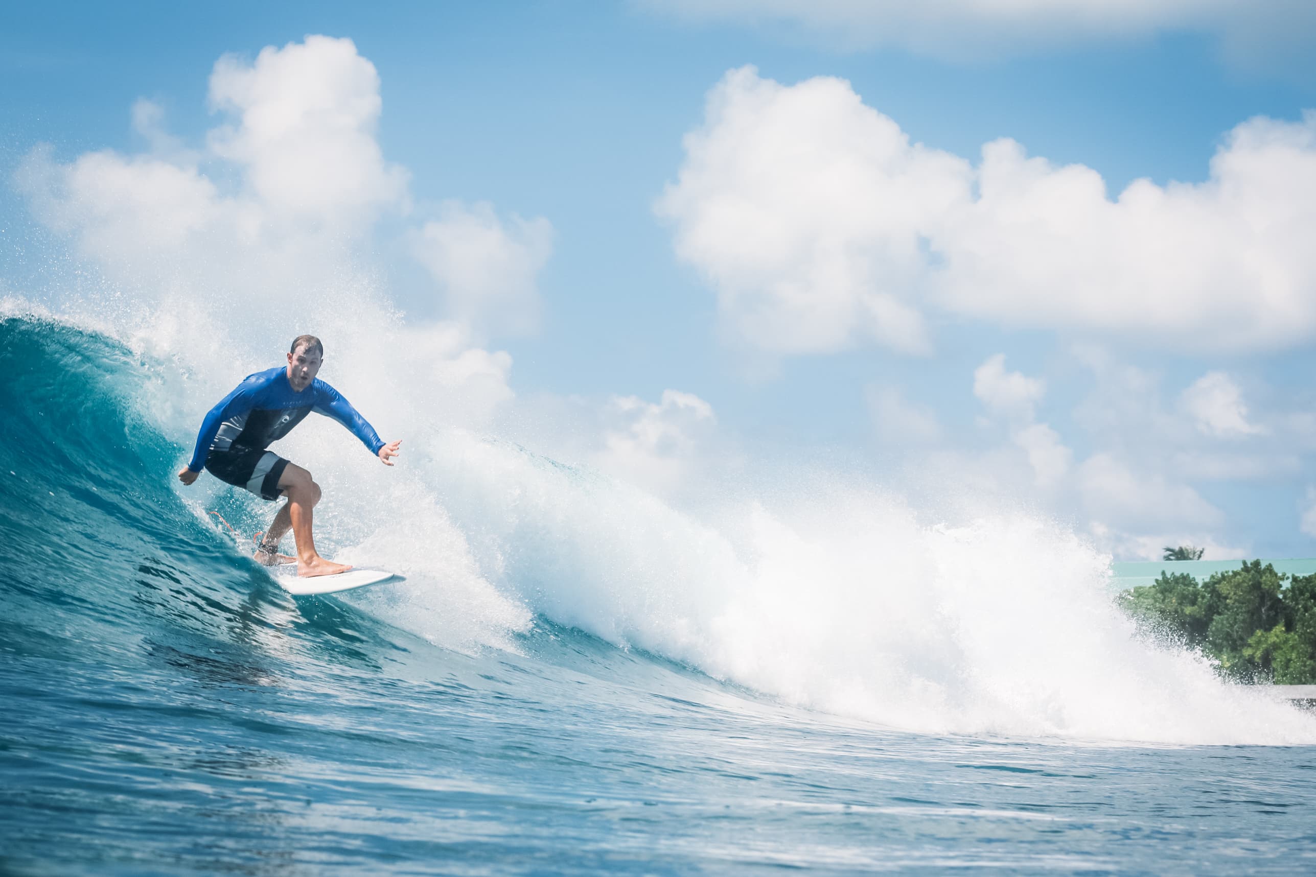 surfer in the Maldives