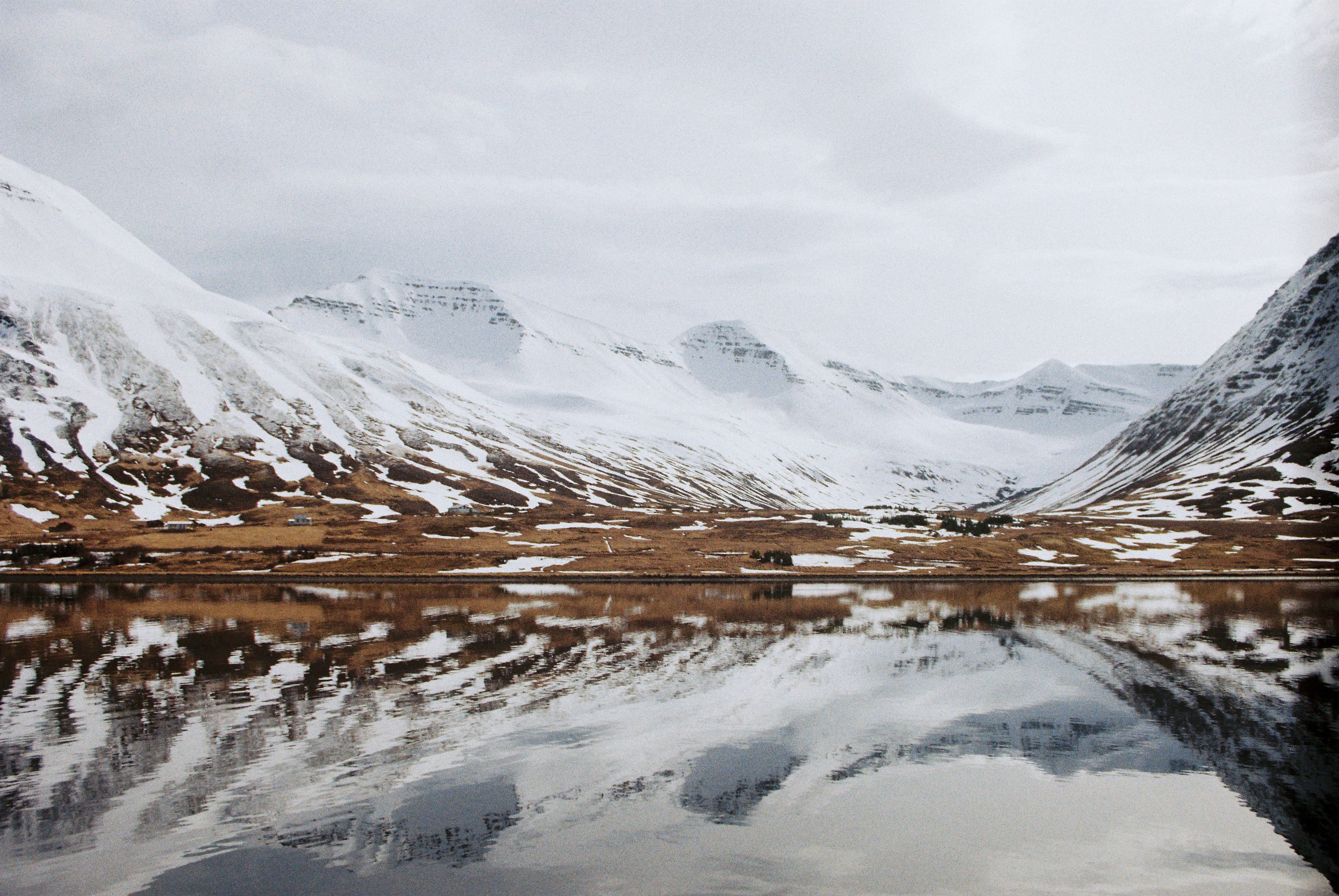 A lake in Iceland with mountains reflection