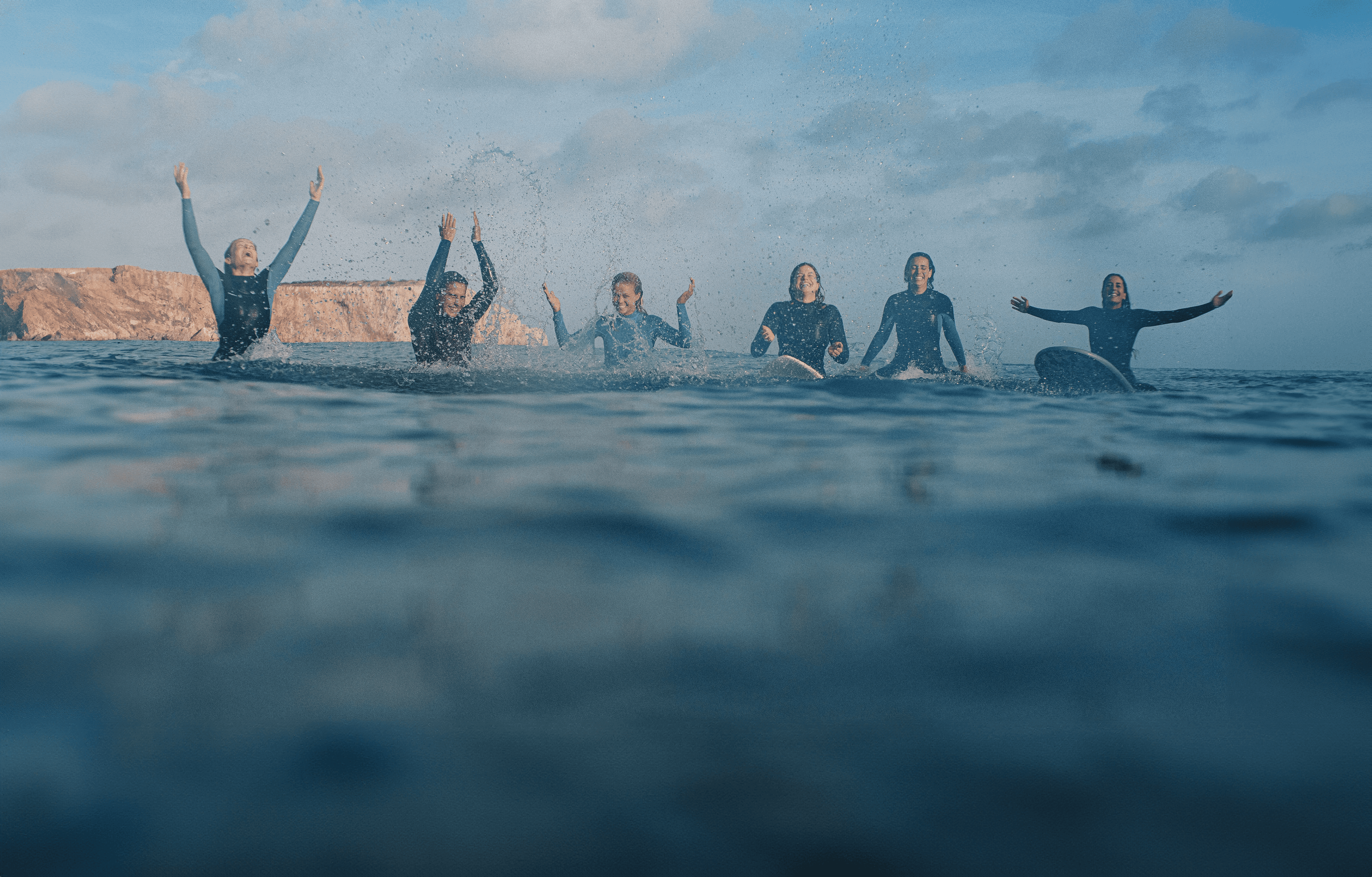 girls surfing in portugal