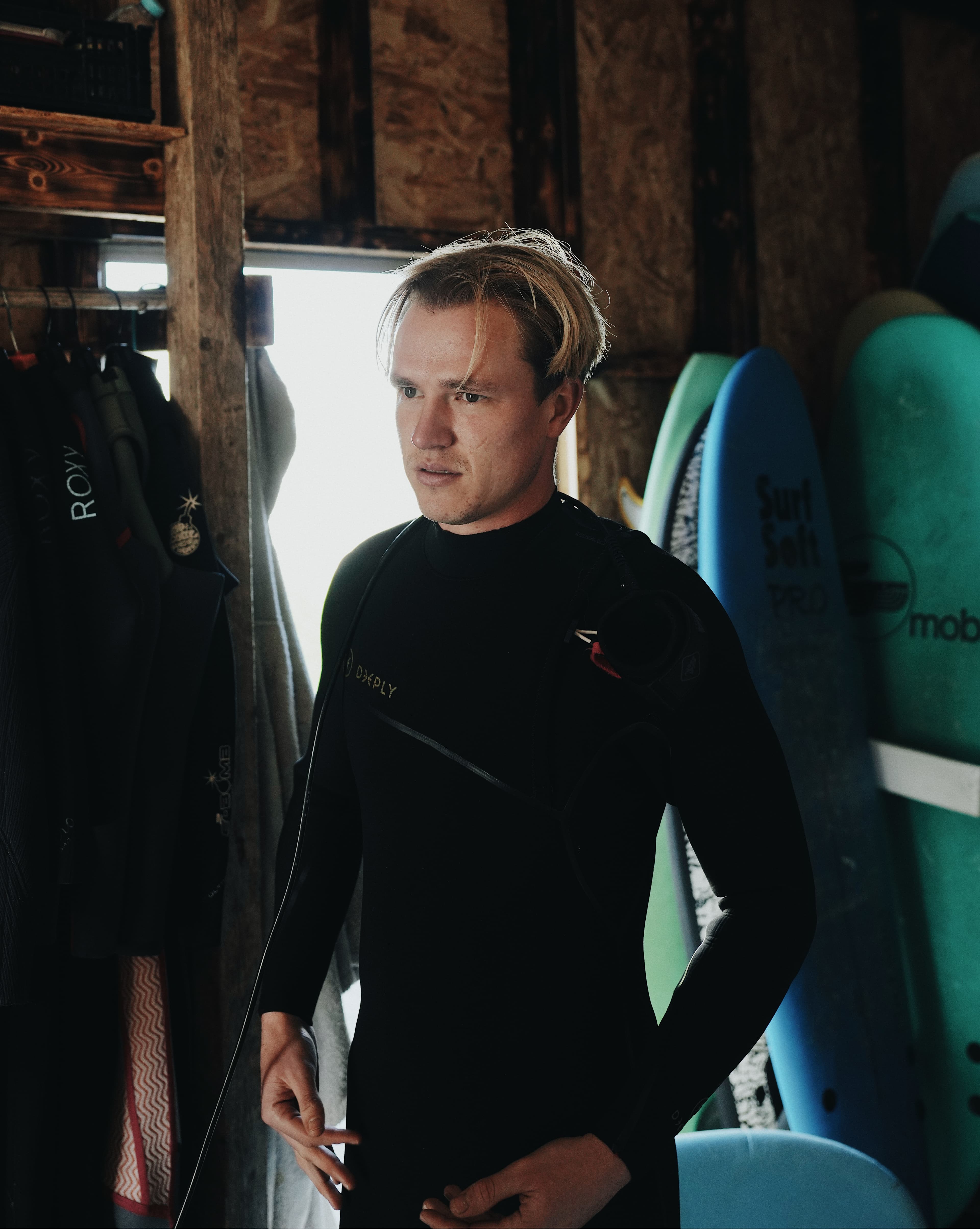 James Manors with a wetsuit in Portugal ready to surf
