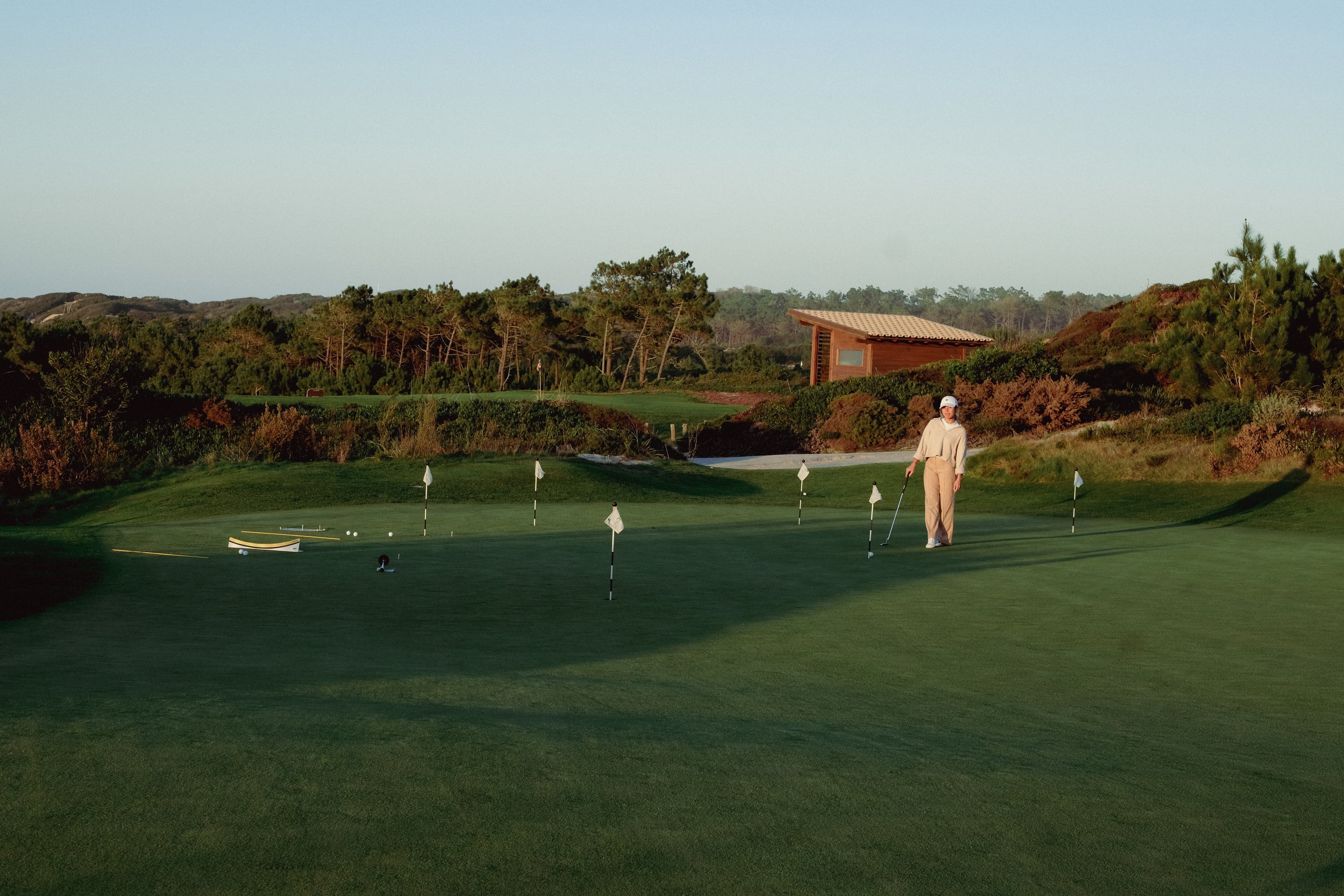 Girl in the practice putting green