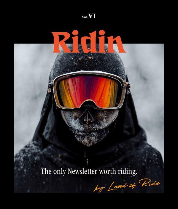 Snowboarder looking at the camera with his goggles