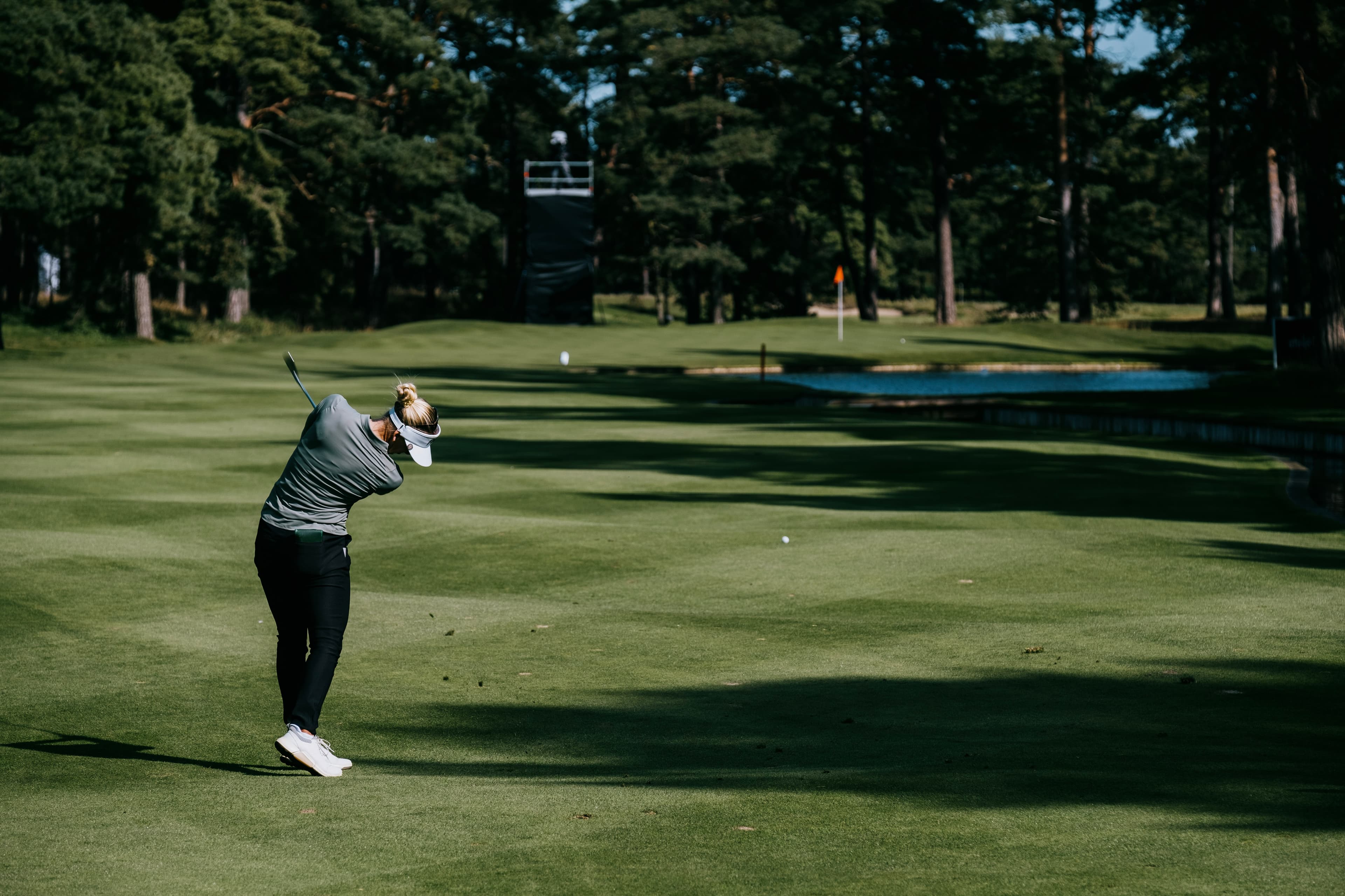 Girl Hitting the Golf Ball