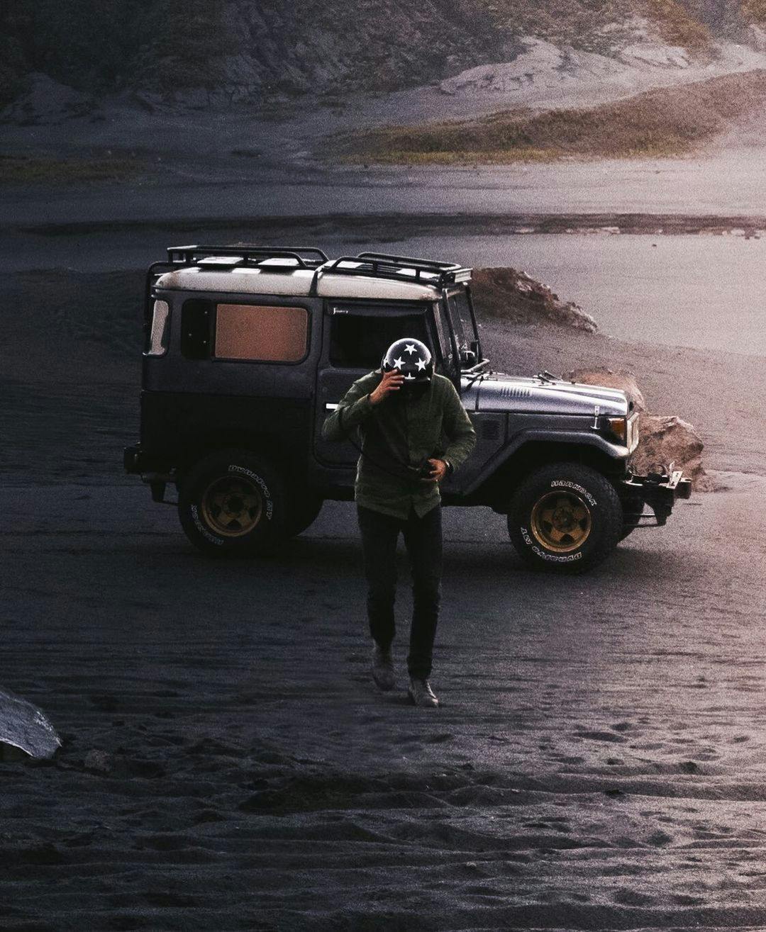 Guy with a Toyota Land Cruiser in the Bromo Desert