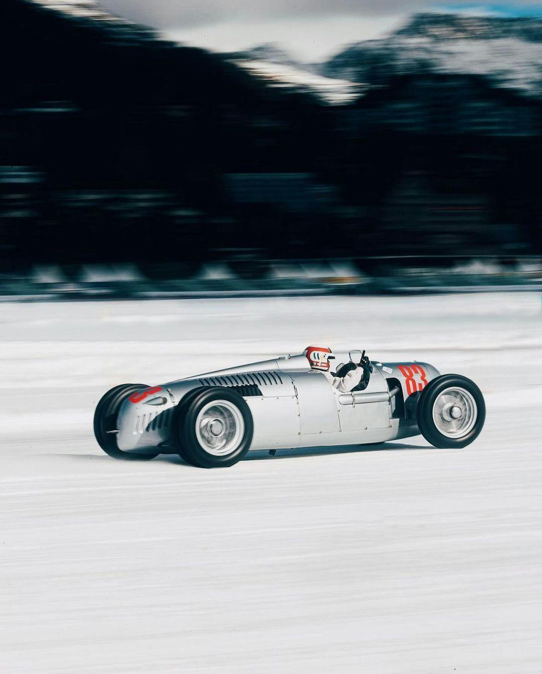 A vintage Car driving on Ice at the Ice Race in St. Moritz