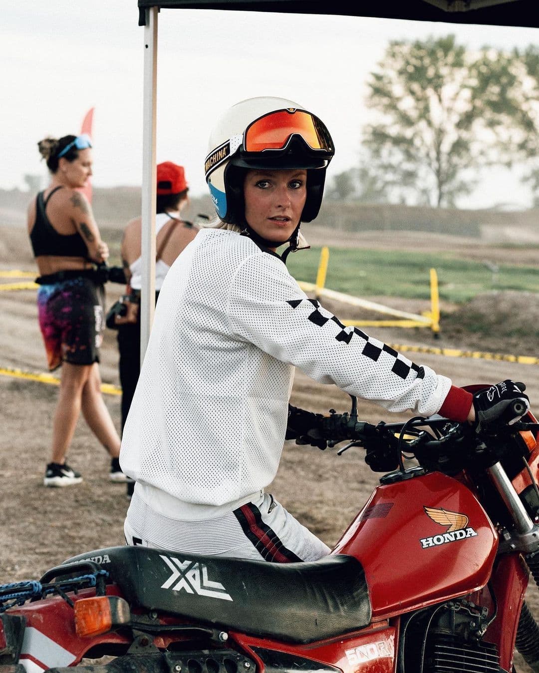 Good looking Girl Riding a Honda Enduro XL 