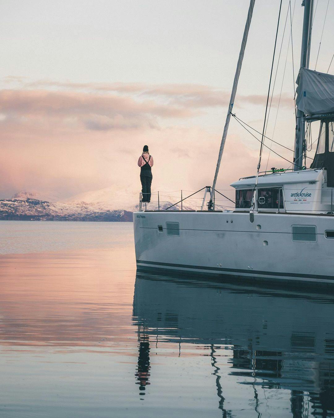 Girl in the sunrise sun in Norway