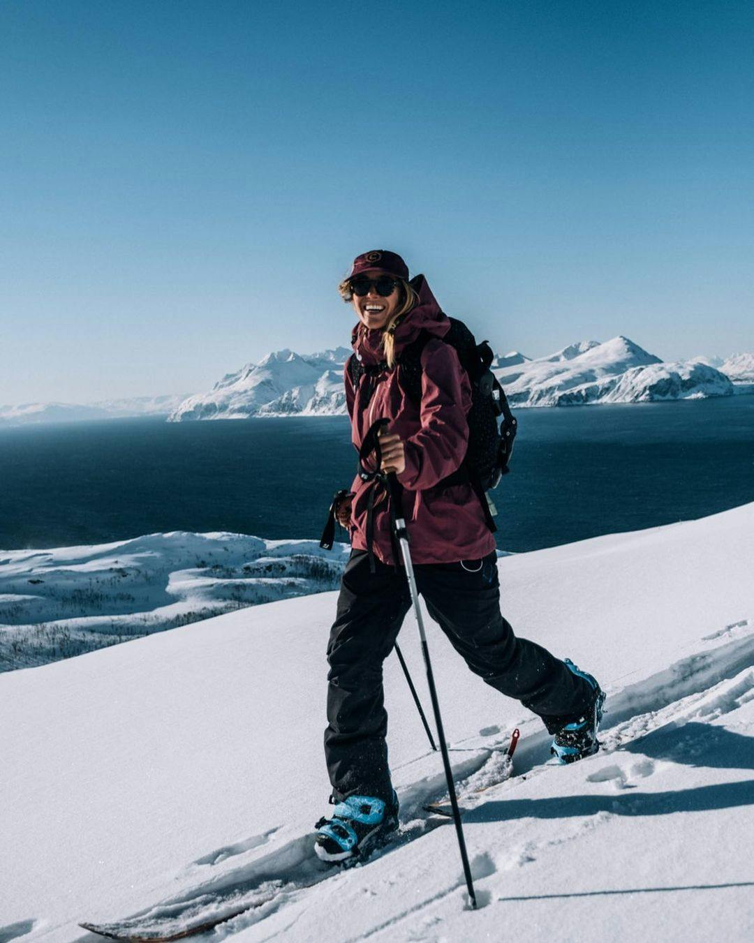 A girl ski touring in the Lyngen Alps