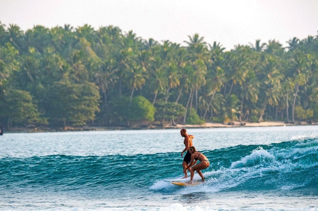 Surf together in the Mentawais