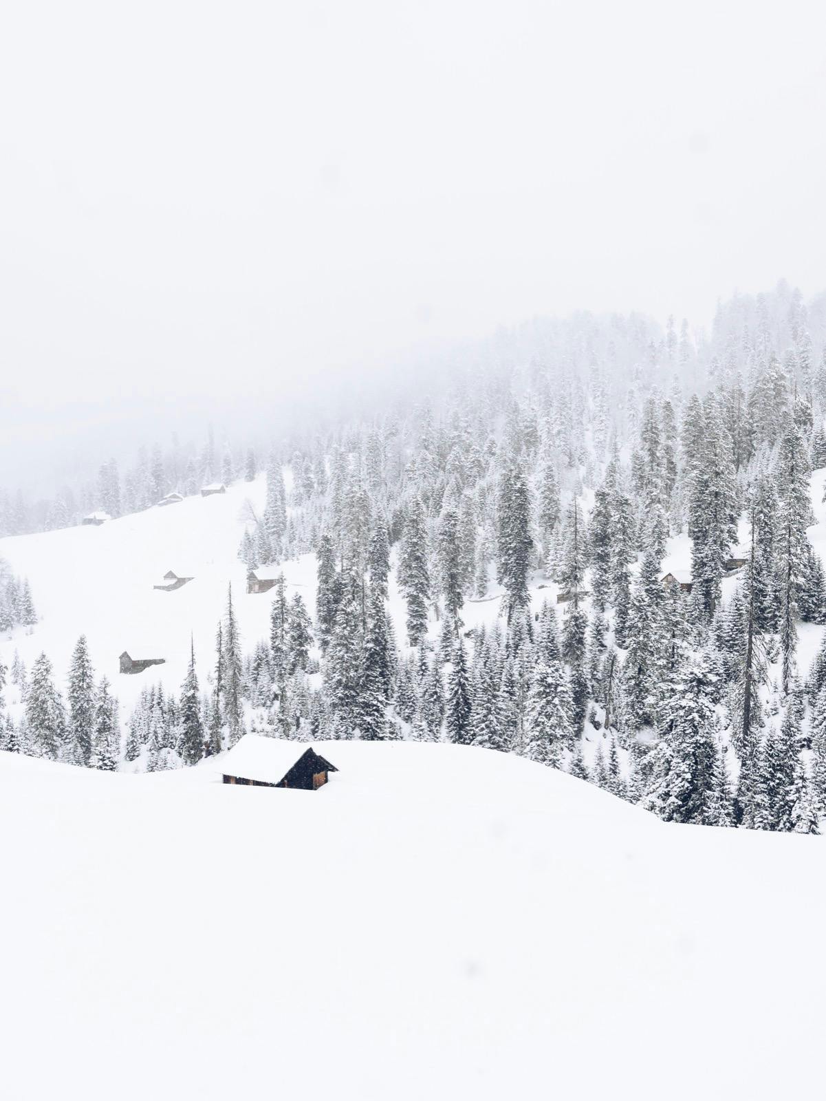 A lonely mountain hut in covered in snow in Georgia