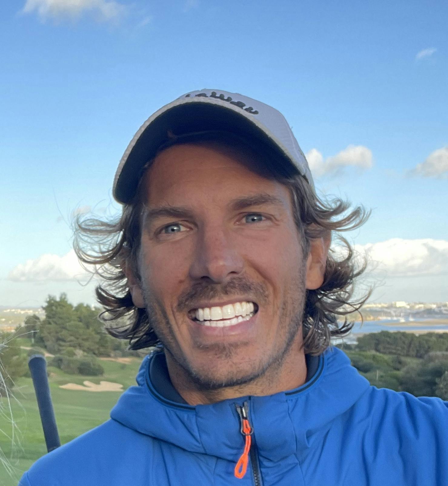 Portrait of Jorge Abian smiling and playing golf in the Algarve
