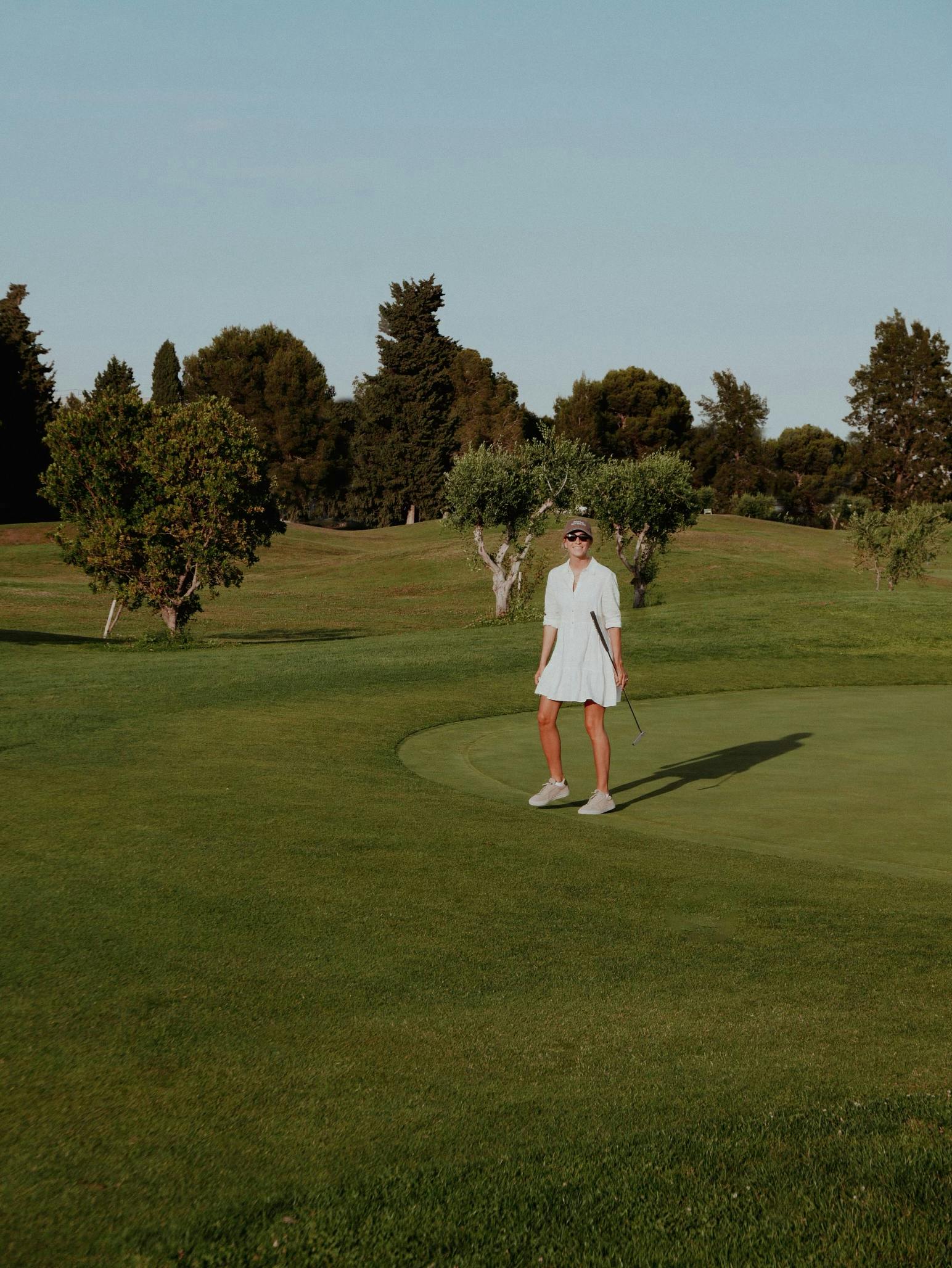 Katha playing golf in portugal
