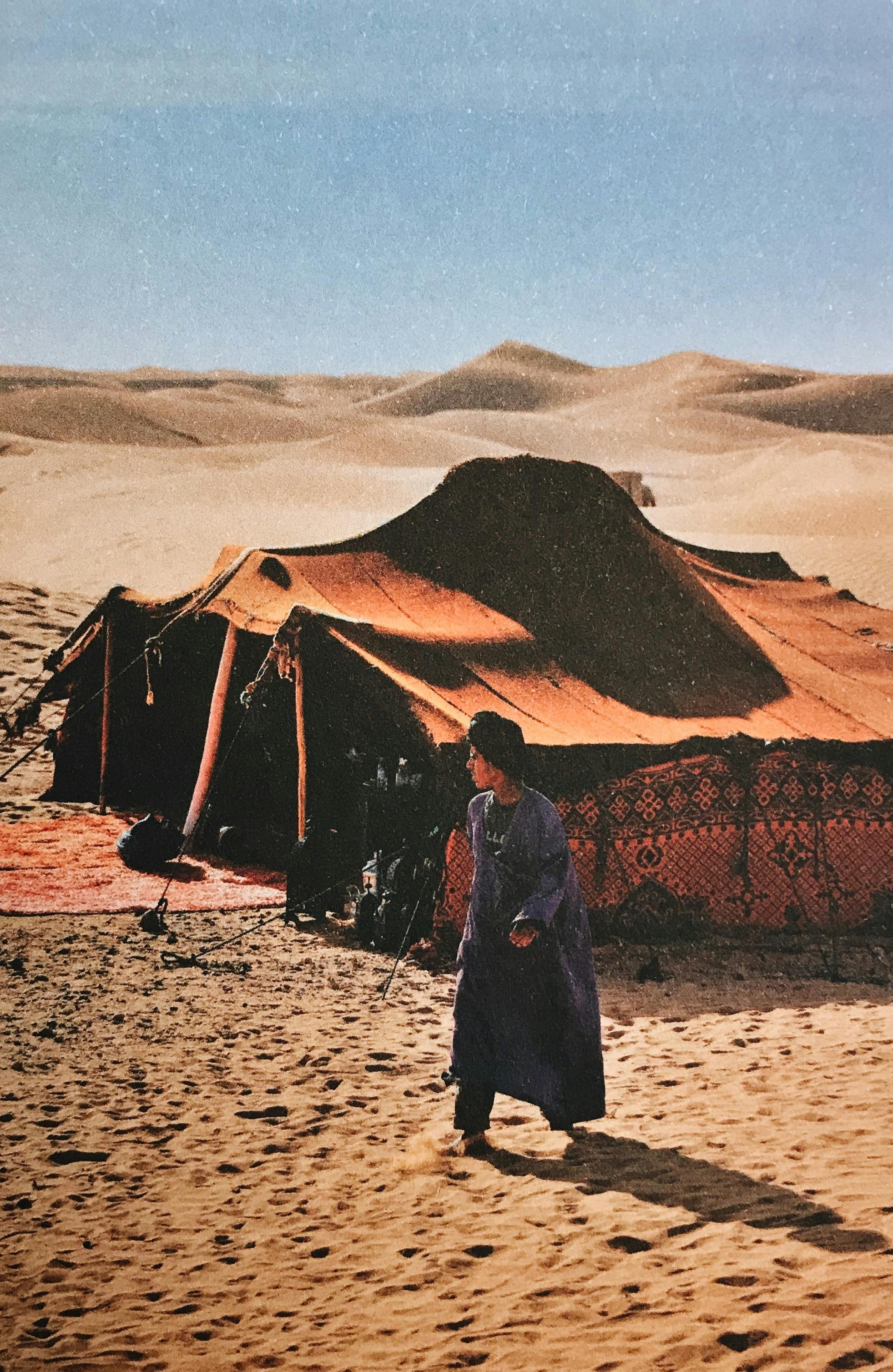 Bedouin and a haima in the desert