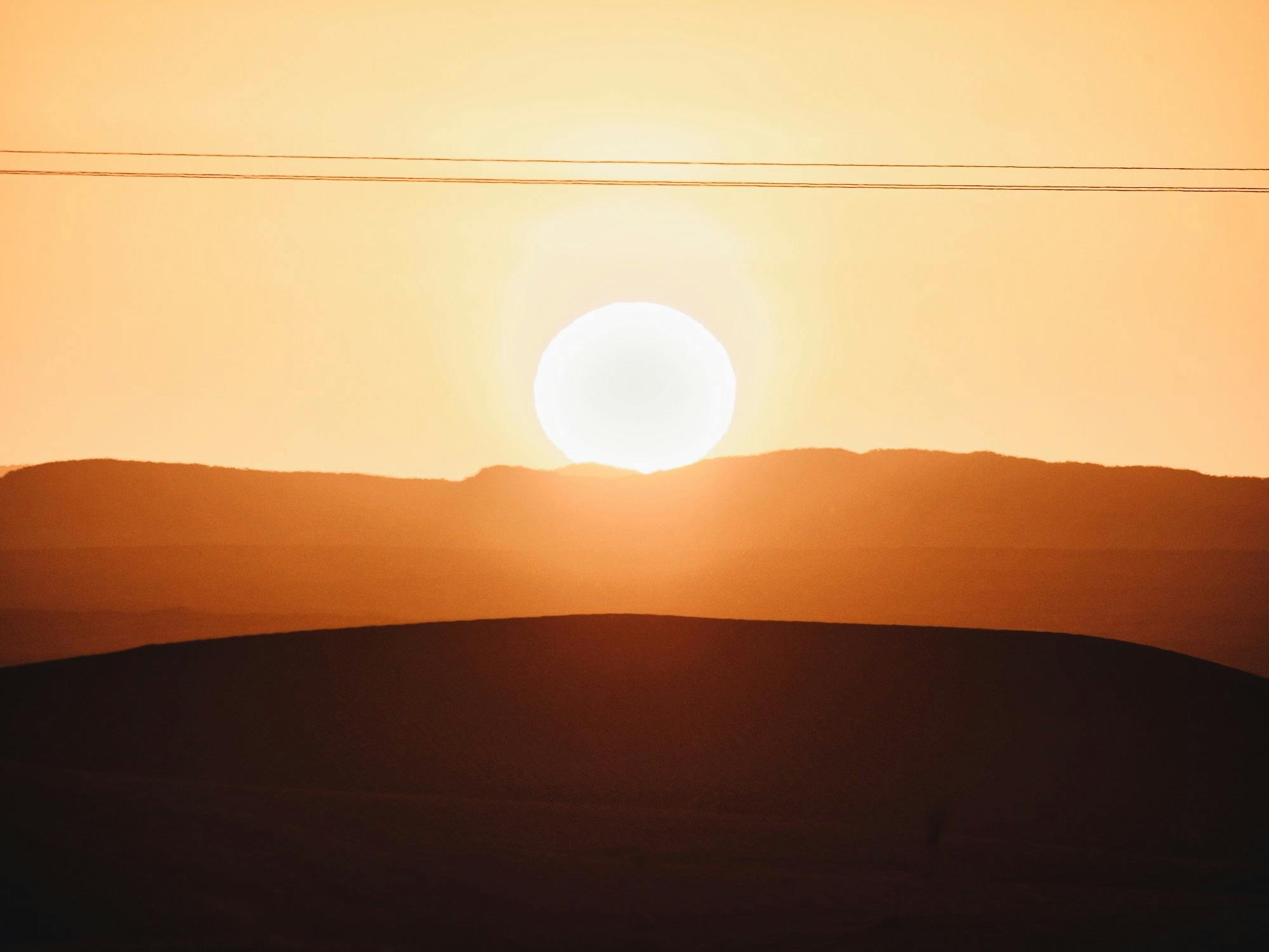 Sun sets in the desert