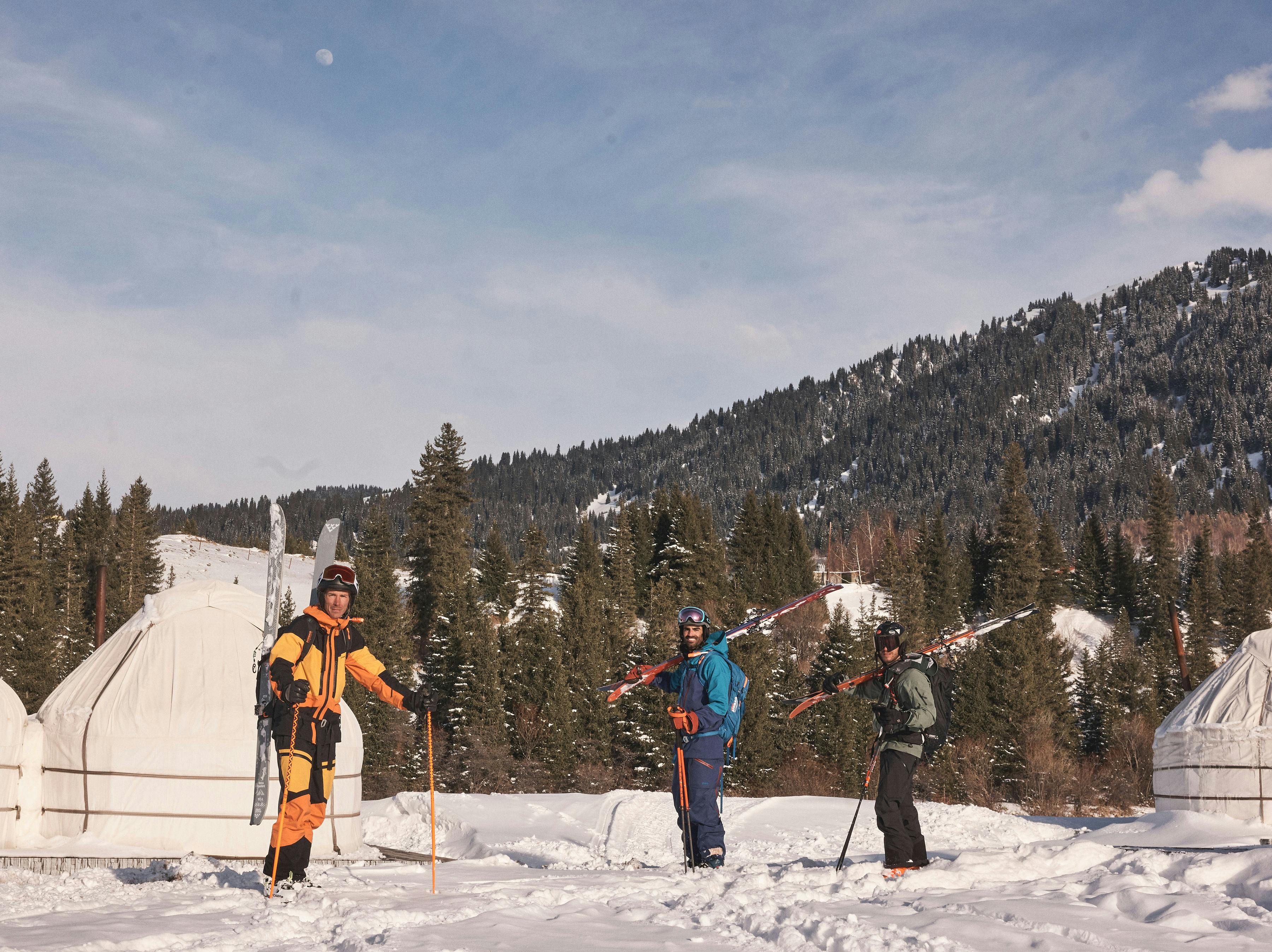 Three skiing friends in Yurts in Kyrgyzstan 